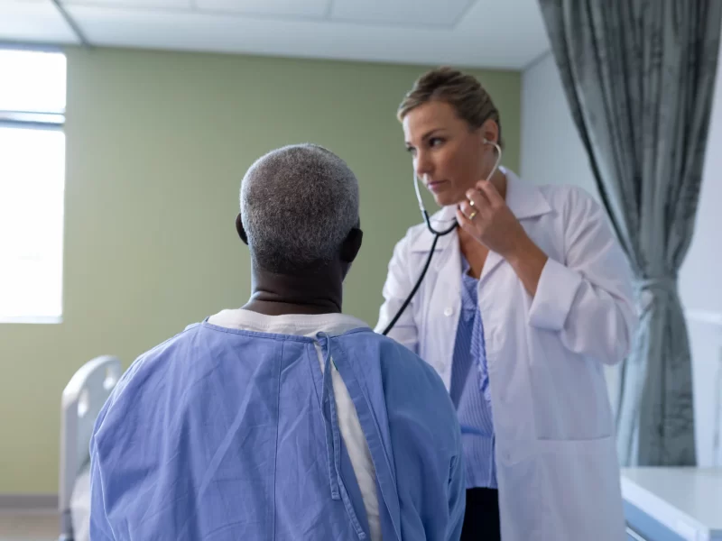 caucasian-female-doctor-examining-with-stethoscope-2023-11-27-05-34-50-utc